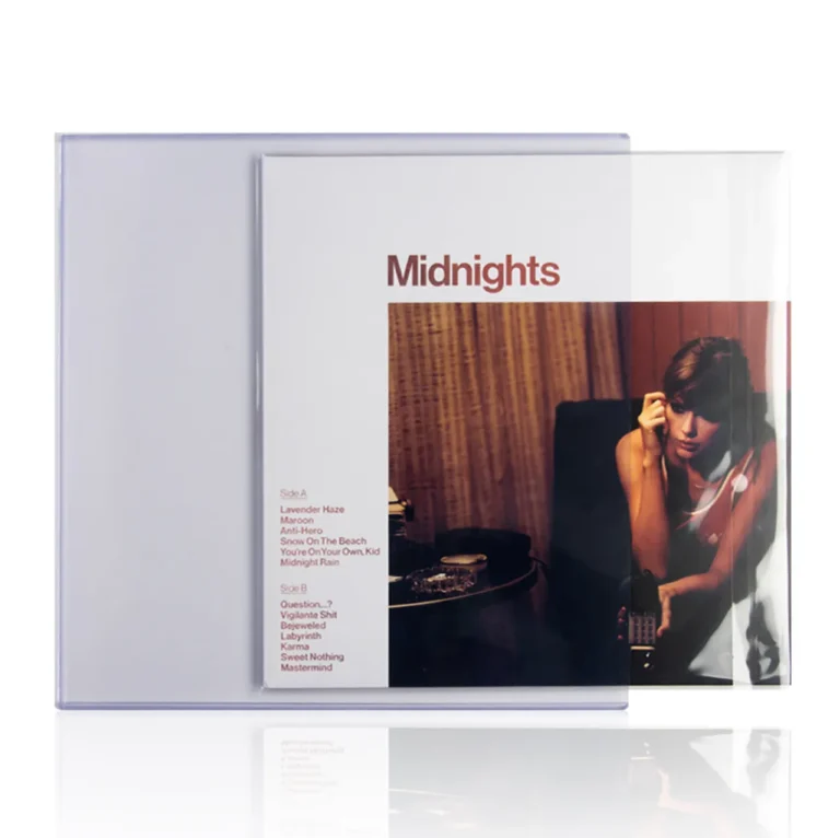 Hands demonstrating inserting vinyl record album cover into open top‑loading LP toploader case