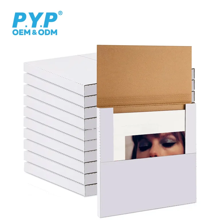 Stack of flat packed white vinyl record mailer boxes, bulk wholesale cardboard LP shipping mailers