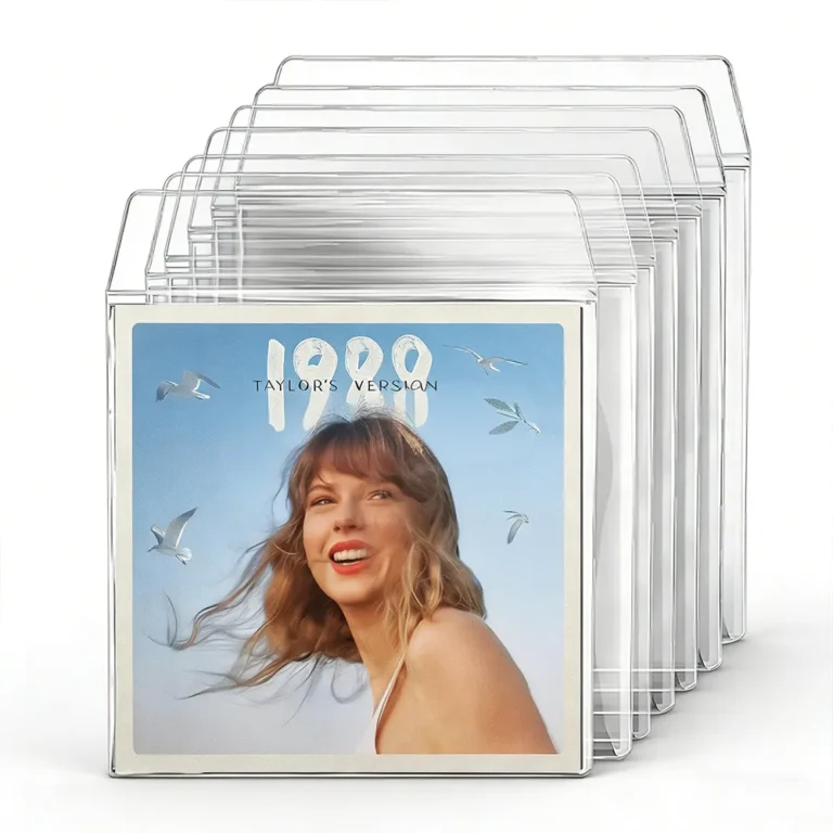 Stack of transparent PVC LP outer sleeves, one sleeve loaded with vinyl record album cover on white background