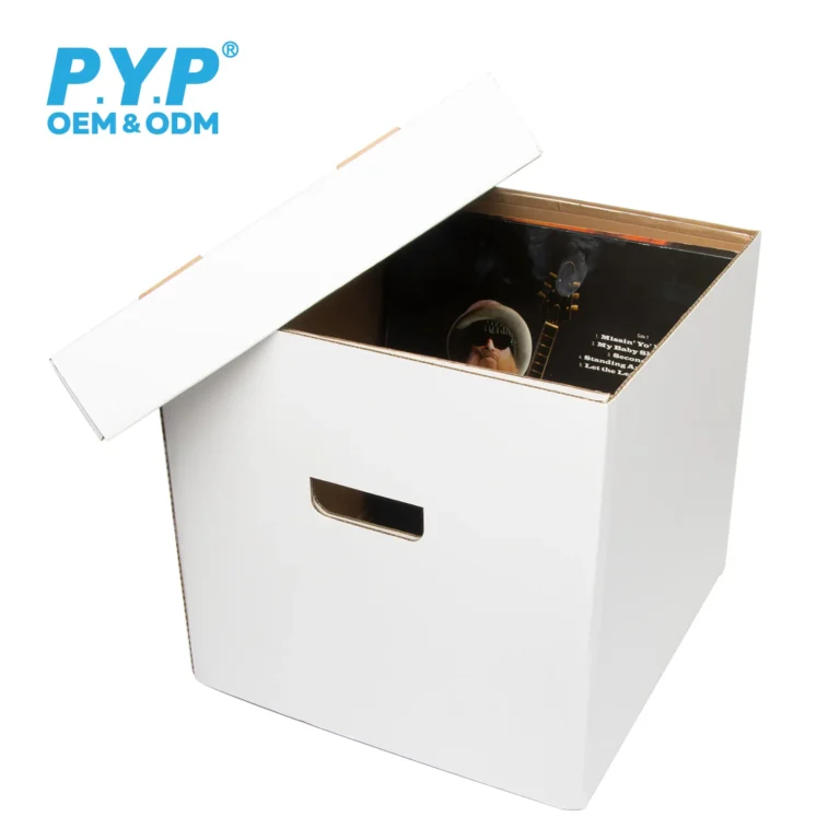 Open white cardboard vinyl record box loaded with 12‑inch LP vinyl records inside