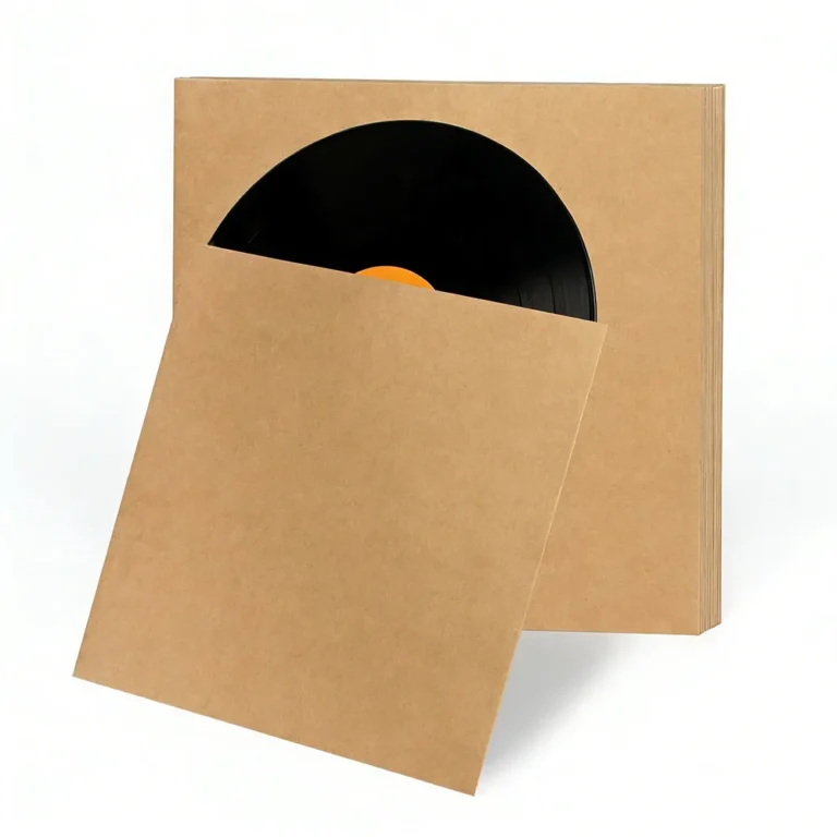 Usage demonstration inserting complete 12‑inch vinyl LP album jacket into hard cardboard outer sleeve